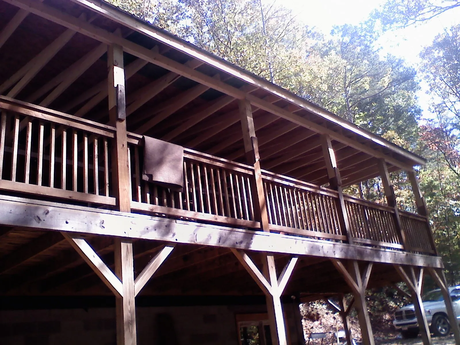 Timber framing under a new elevated porch and deck — Roof Leak Repair in Gilford by Roofing Brothers